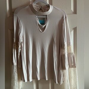 Light pink Blouse with lace sleeves. Size M